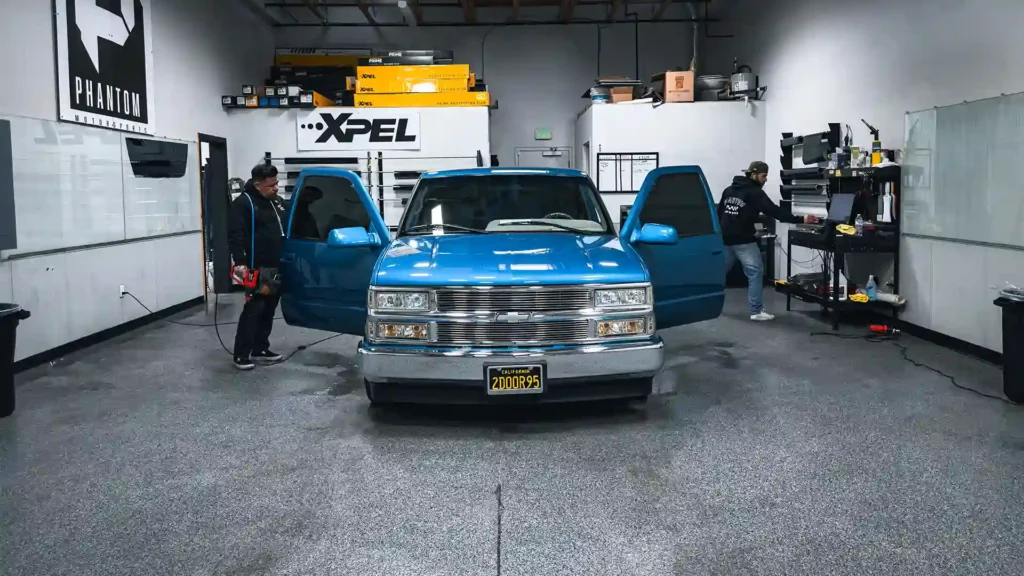 Phantom filmwerkz installing XPEL XR Plus Ceramic Window Tint on a 1996 Chevrolet CK 1500.